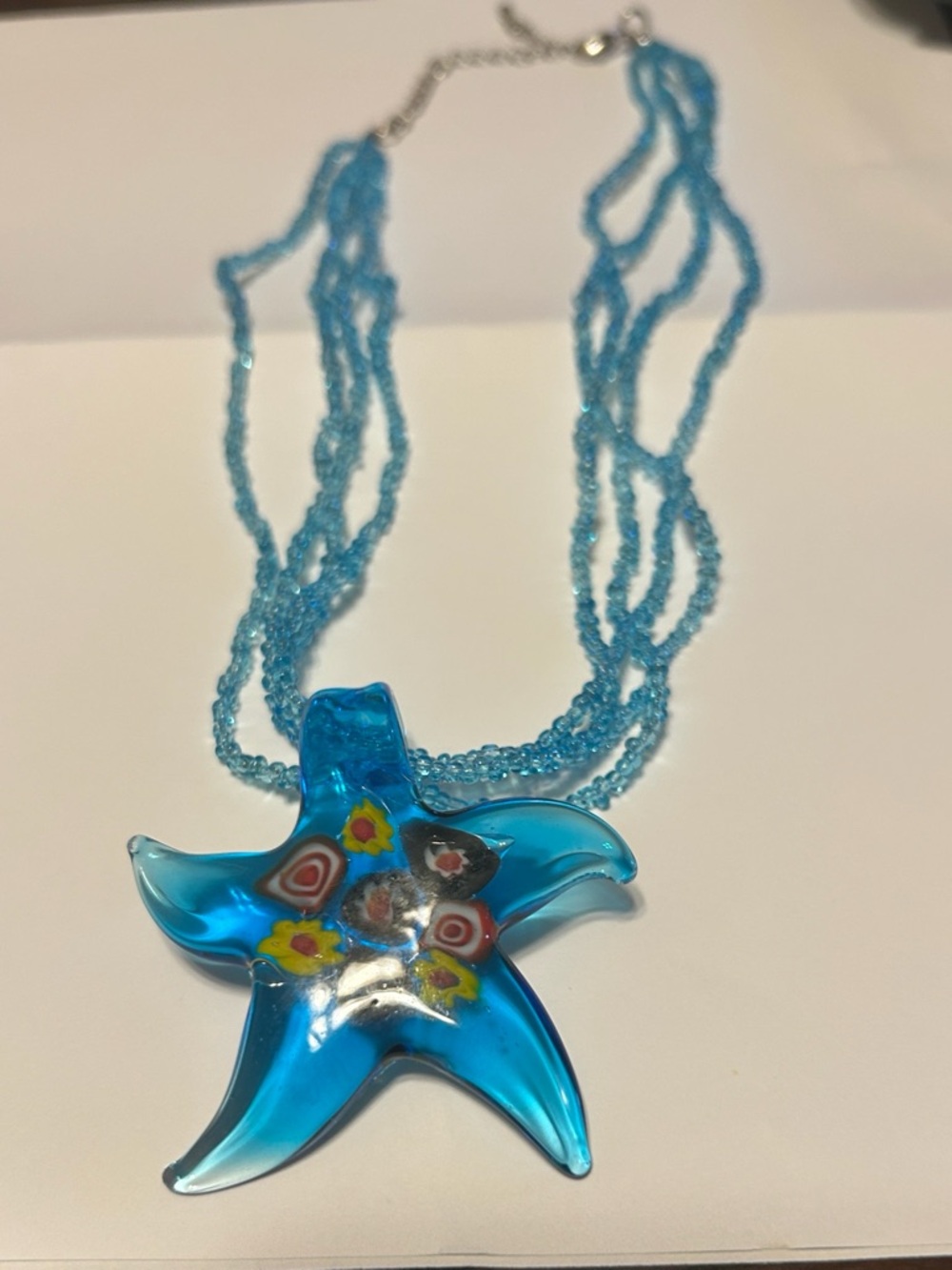 EUC Glass Beaded Unbraided Light Blue Necklace with Aqua Blue Star Fish Pendant